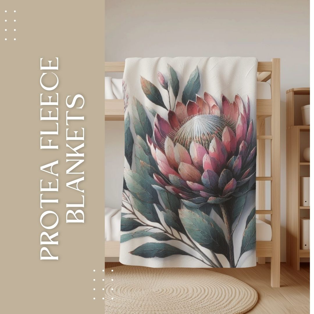 Protea fleece blanket with original South African floral design displayed on a bed.