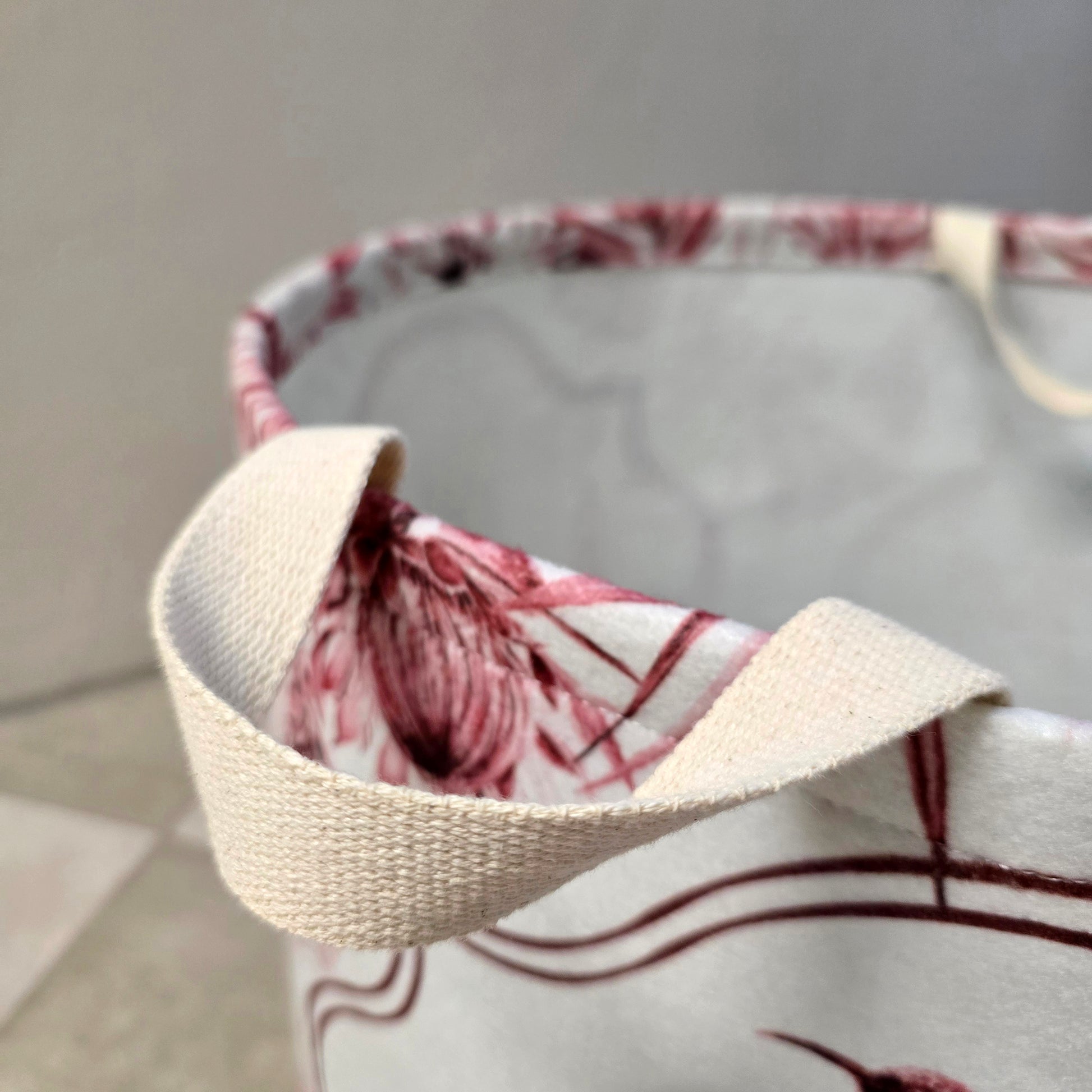 Strong felt laundry basket with protea artwork
