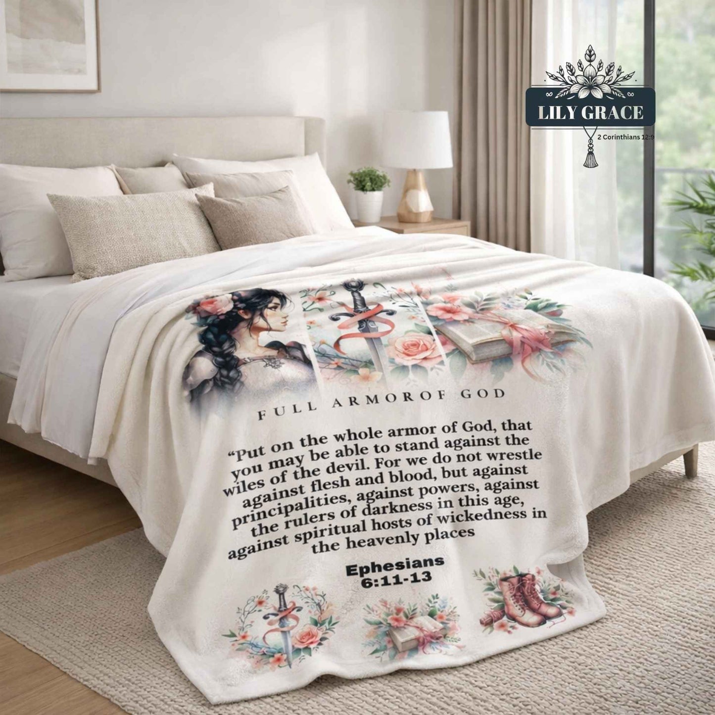 Faith blanket featuring Ephesians 6:11–13 laid across a bed, with floral artwork, sword imagery, boots illustration, and inspirational Christian design.