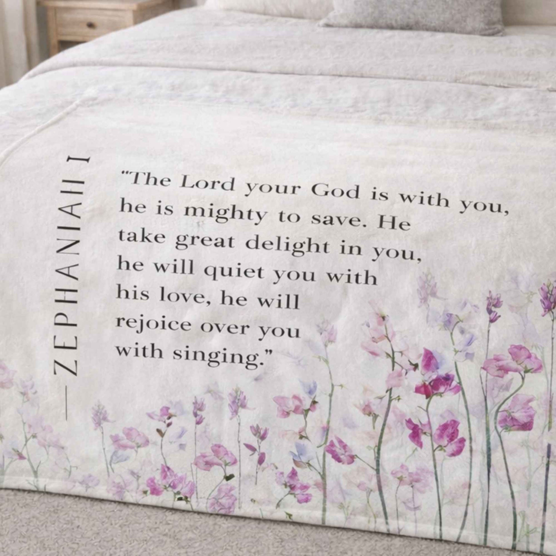 Lightweight faith blanket with soft pink botanical flowers and Bible verse. Christian bedding 