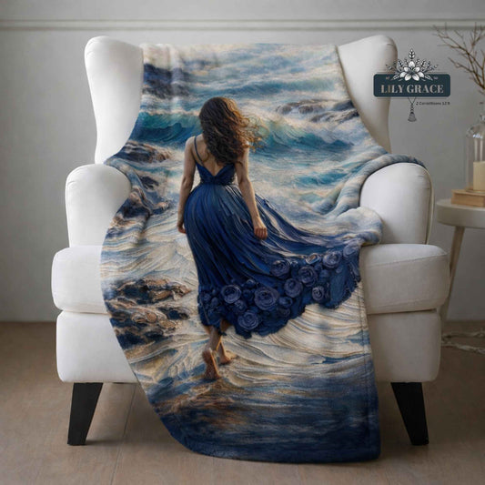 Ocean Song blue fleece blanket draped over armchair