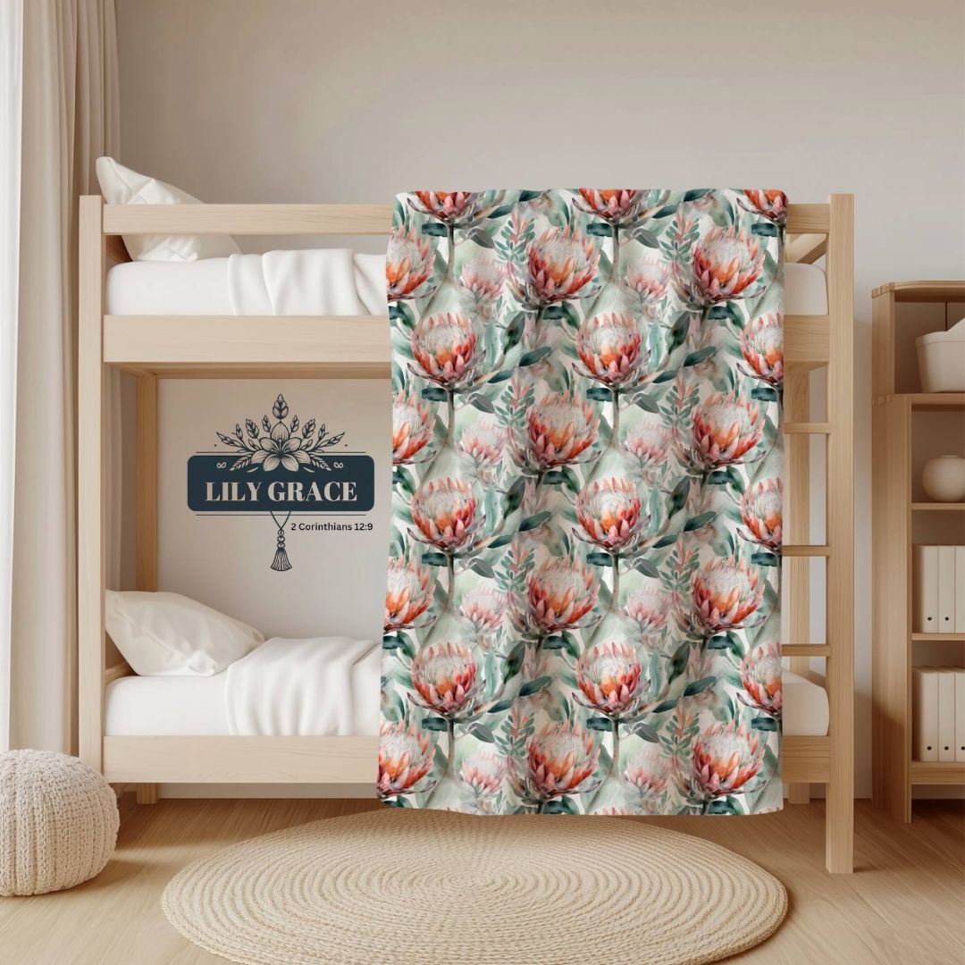 Gift for her birthday – protea scatter cushion cover and designer coffee mug.