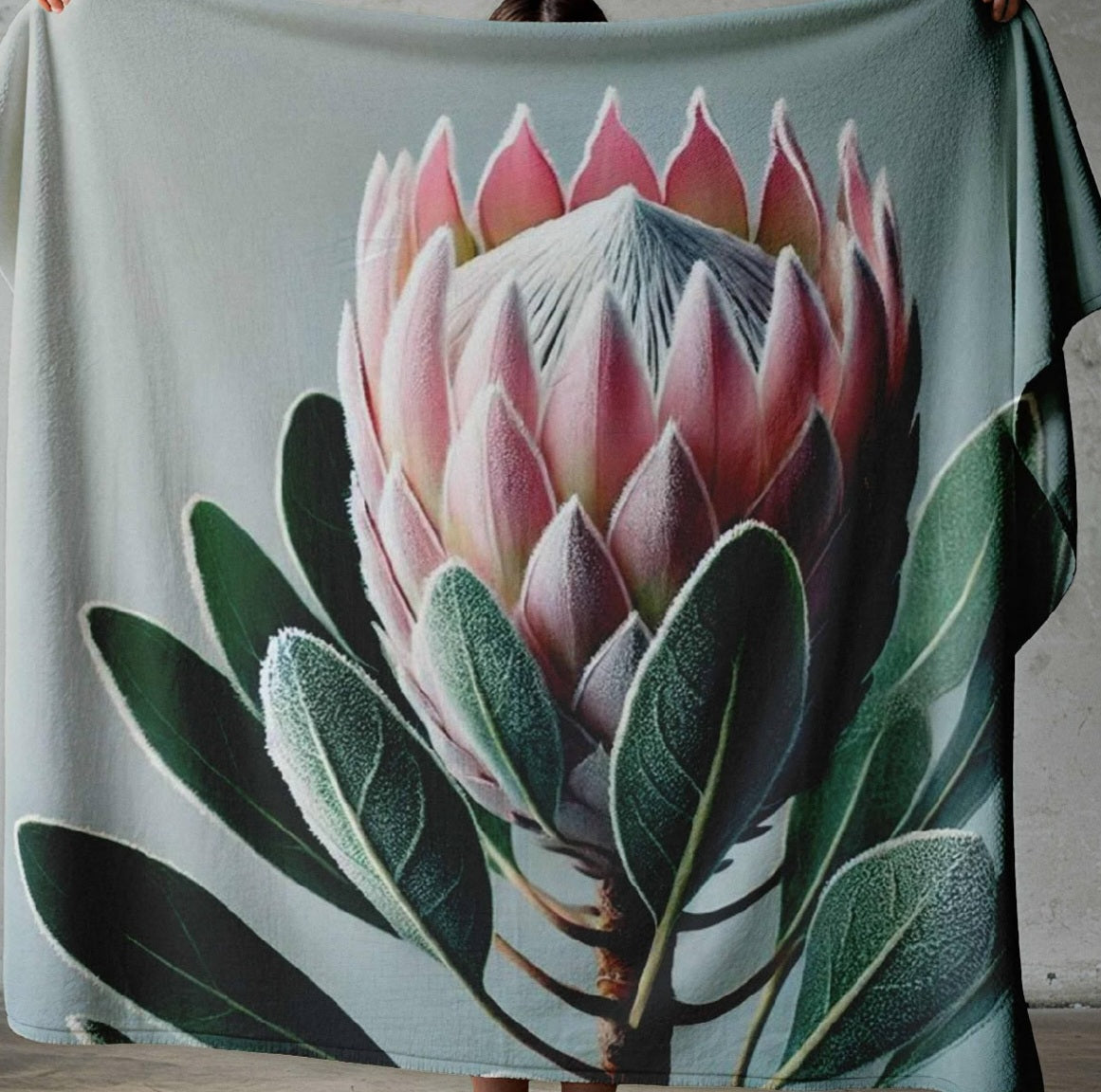 Protea coral fleece throw blanket and matching scatter cushions by Lily Grace Design.