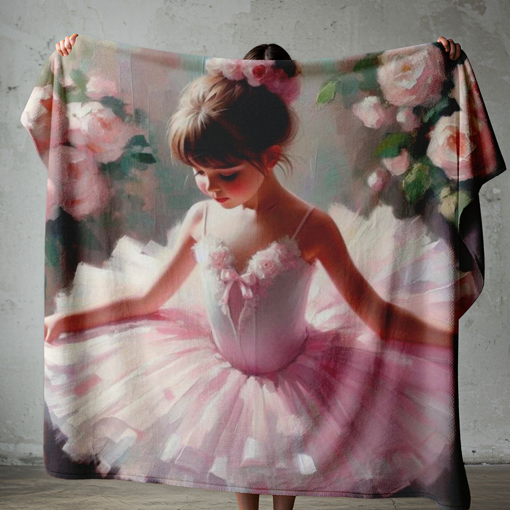 Petite Ballerina lightweight fleece blanket on a white bed with soft pink ballet girl artwork and floral details.