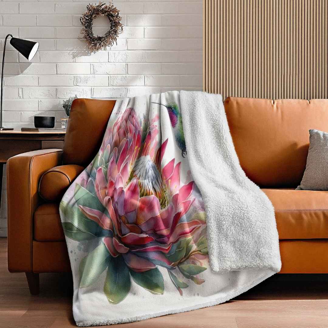 South African protea blanket with double layer fleece, soft textured backing and colourful botanical print