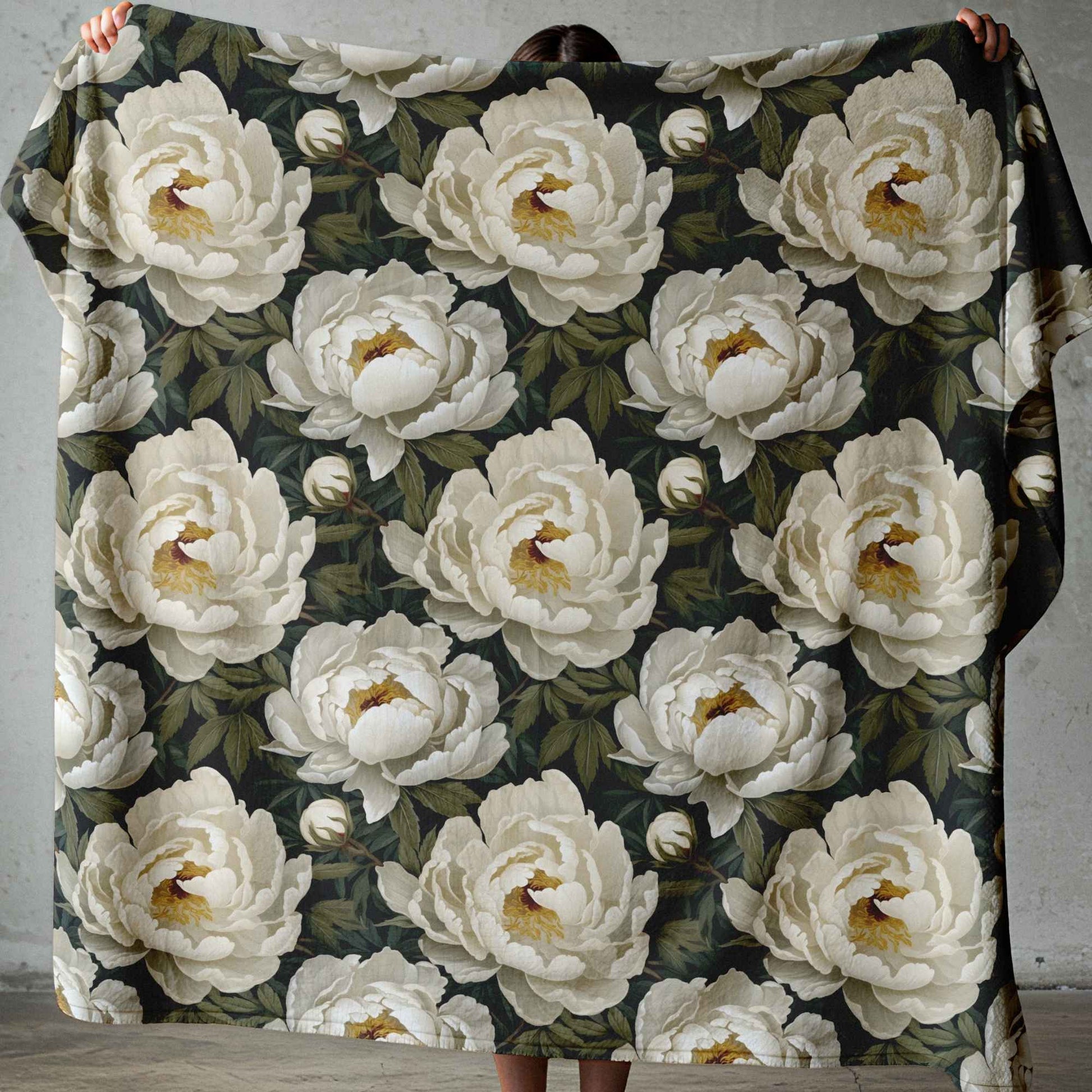 Soft lightweight fleece throw blanket featuring large white flowers and deep green leaves for South African homes.