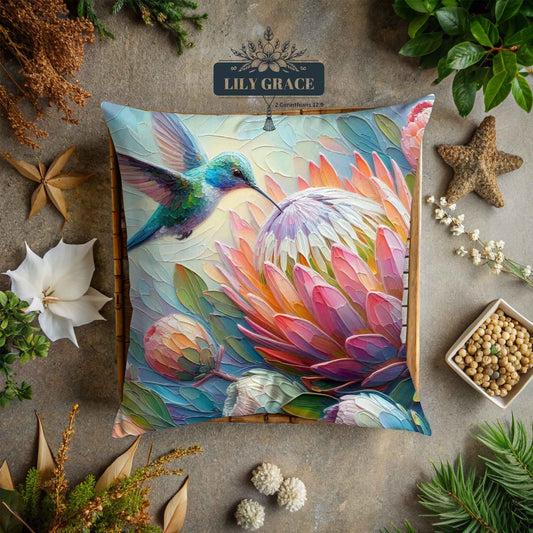 Close-up of hummingbird and protea artwork on cushion cover