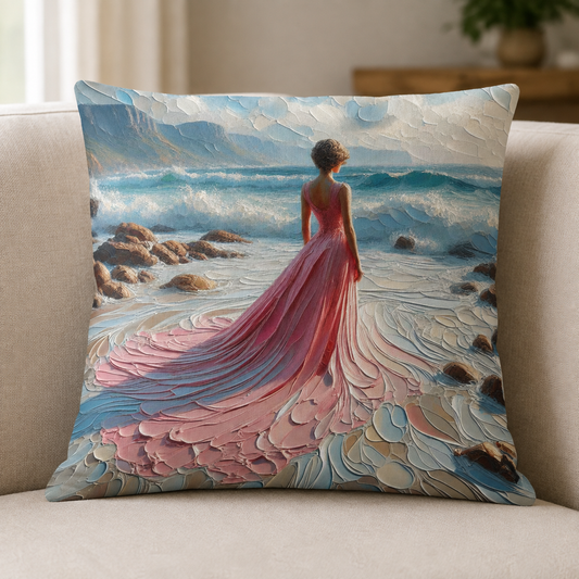 45 × 45 cm cotton scatter cushion cover with a woman in a flowing pink dress by the sea, displayed on a neutral sofa.