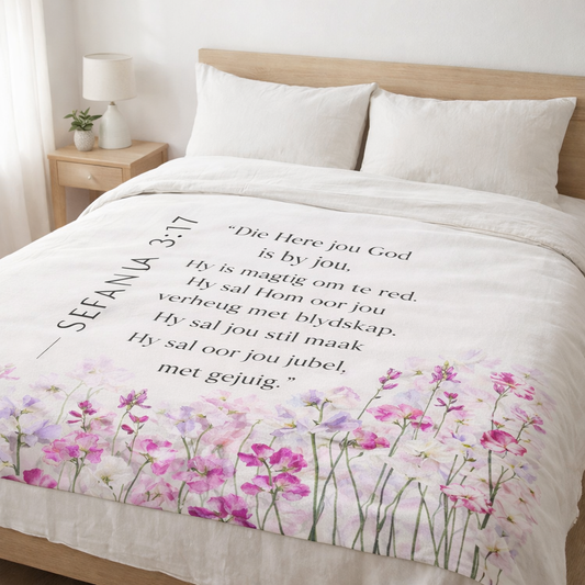 Sefanja 3:17 Afrikaans faith blanket with floral design on bed. Christian bedding 