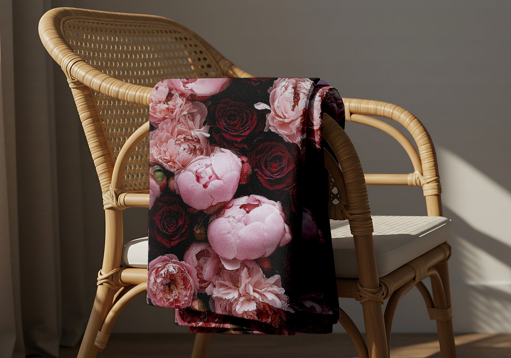 lightweight coral fleece floral blanket draped over chair